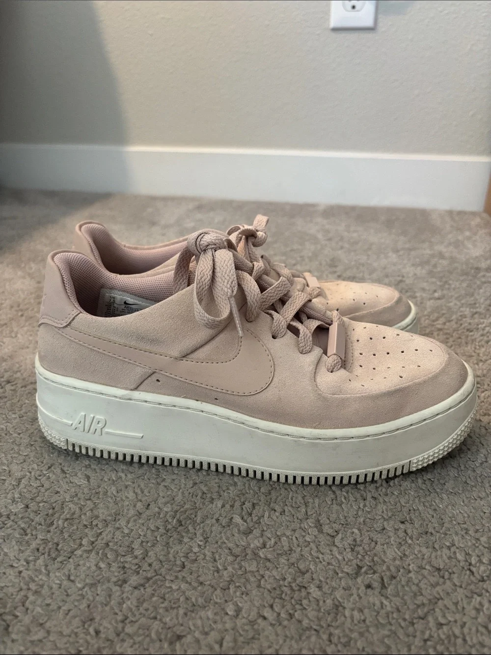 Nike Women’s Pink Suede Platform Sneakers
